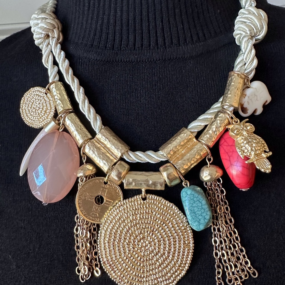 Multi colored stones and charms versatile  statement necklace.